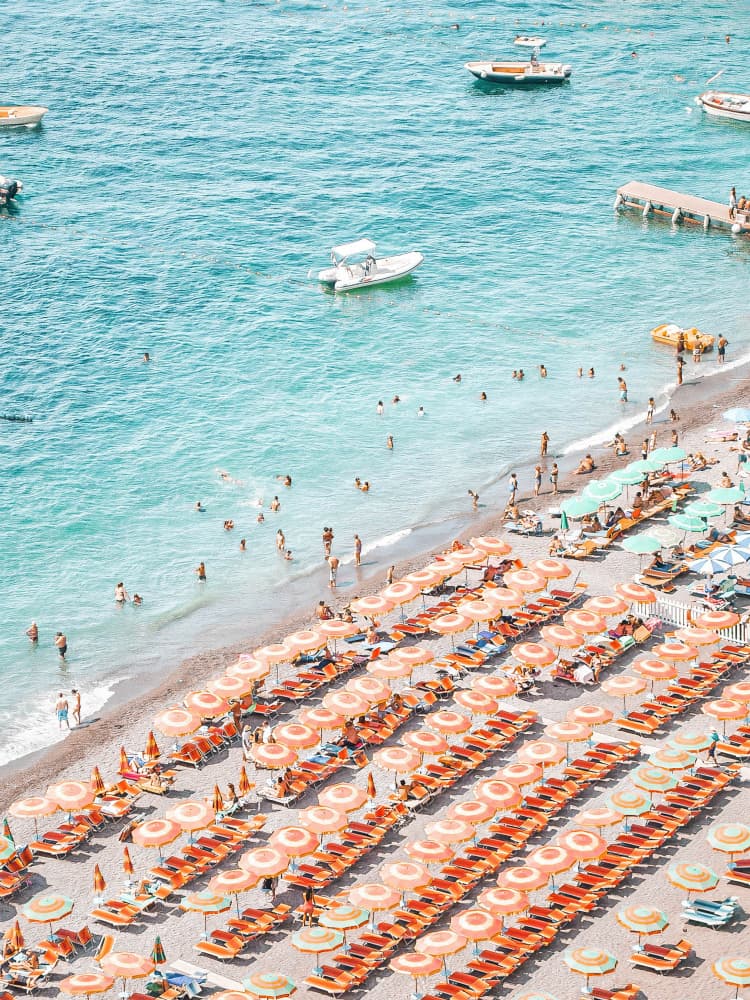 Orange Umbrellas Beach Day by Talitha McQueen — canvas wall art