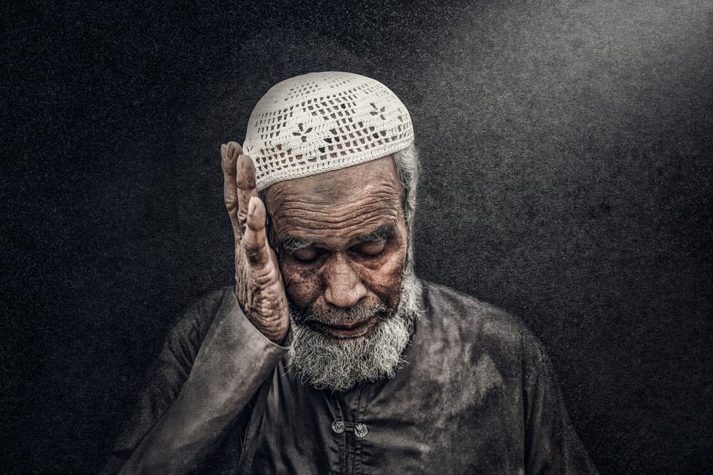 Man in Solemn Prayer by Husain ALSaeed — canvas wall art