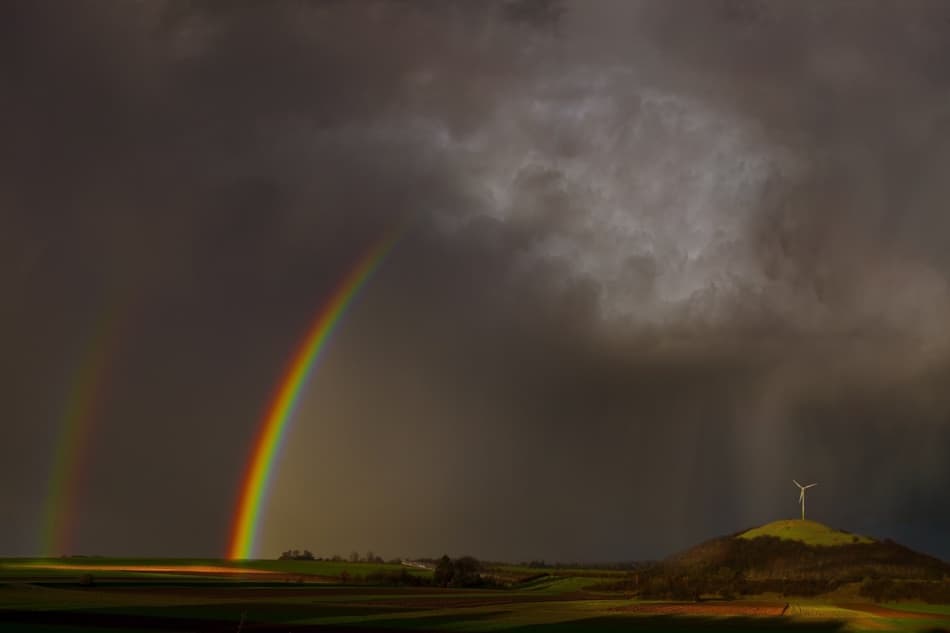 Dramatic Double Rainbow Fields by Nicolas Schumacher — canvas wall art
