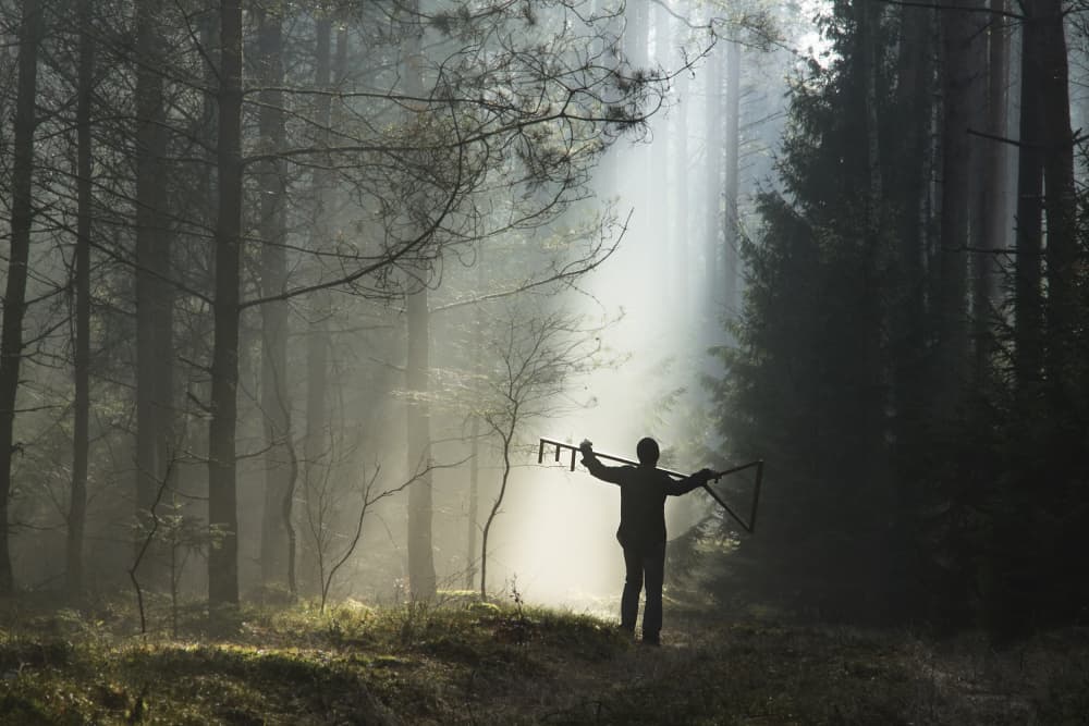 Misty Forest Man Silhouette by Leszek Paradowski — canvas wall art