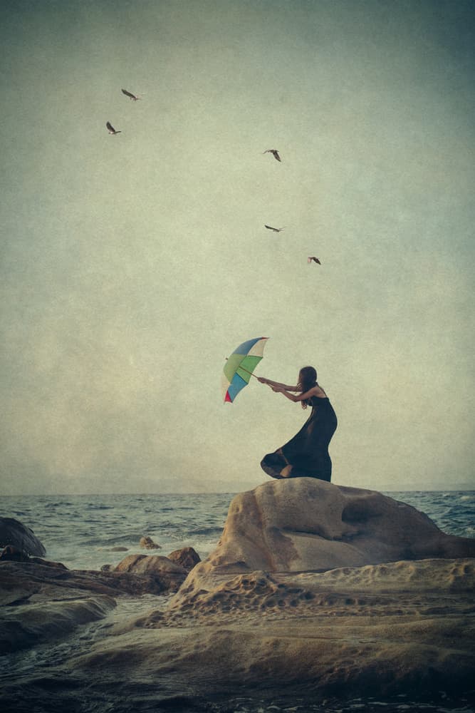 Umbrella in the Coastal Wind by Svetlana Bekyarova — canvas wall art