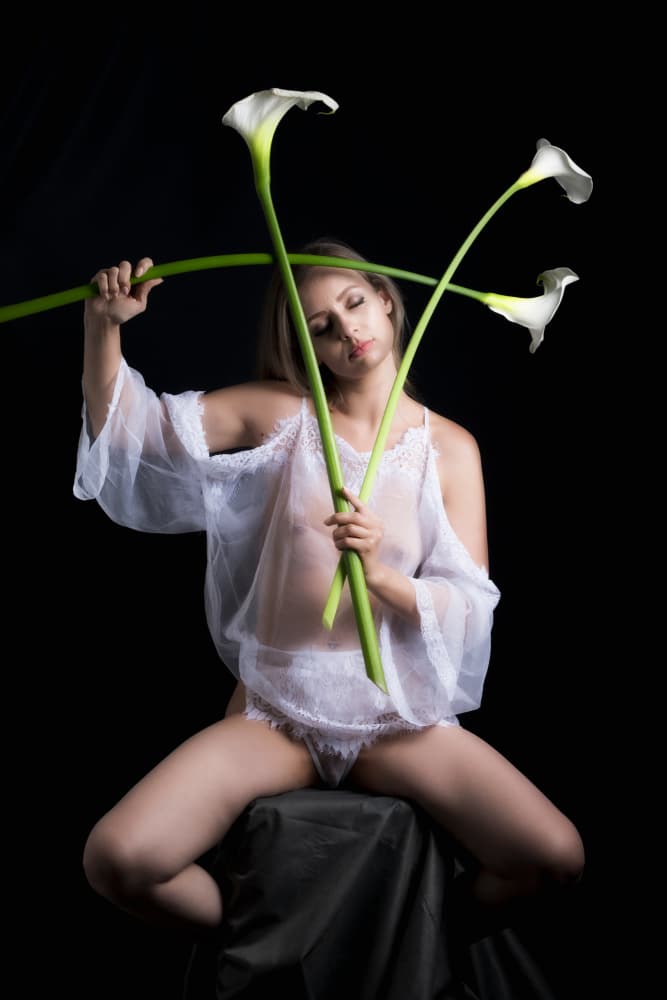 Woman with Calla Lilies by Ashley Sowter — canvas wall art