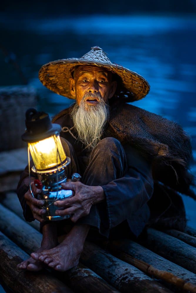 Night Fisherman Glow by Amnon Eichelberg — canvas wall art