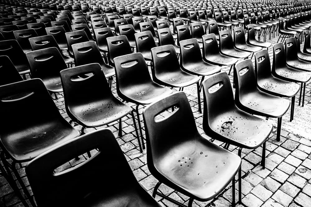 Empty Chairs Waiting by Pawel Majewski — canvas wall art