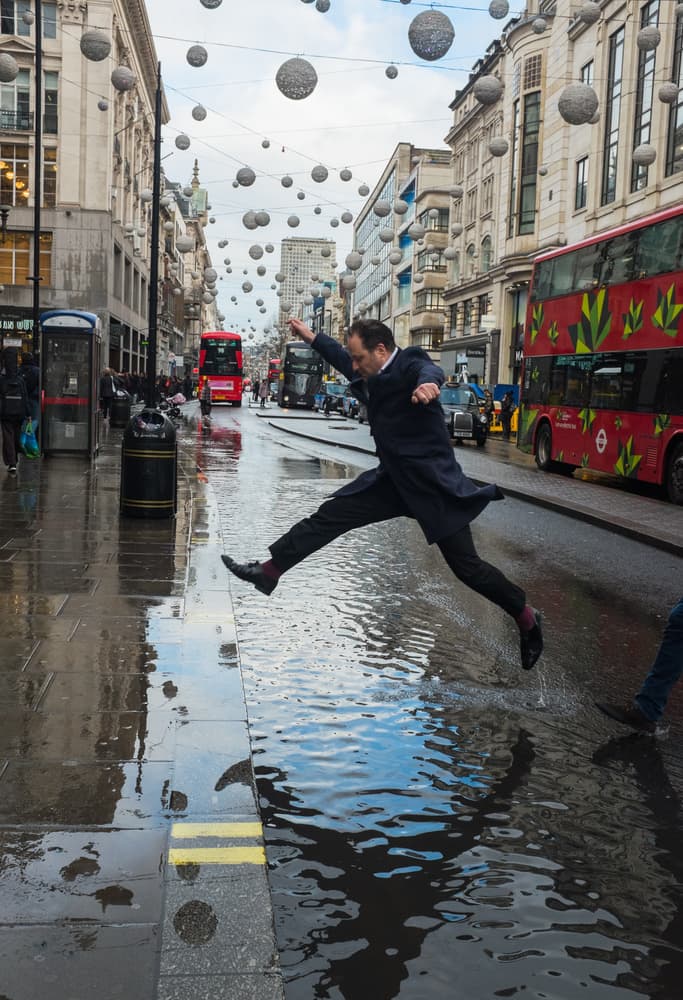 Urban Puddle Jump by Lorenzo Grifantini — canvas wall art