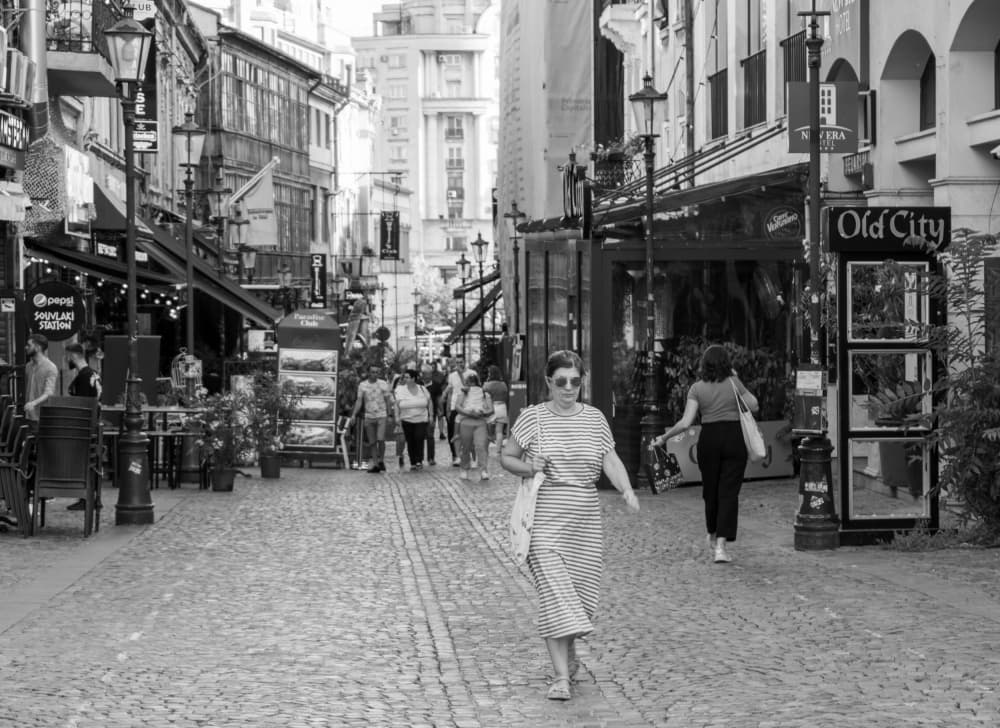 Old City Street Stroll by Alexandra Isbasoiu — canvas wall art
