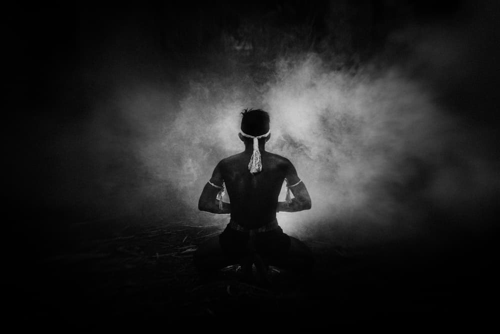 Kneeling Muay Thai Fighter by ADIREK M — canvas wall art