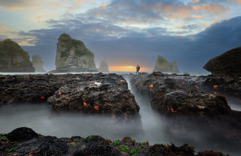 Misty Coastline Sunset by YANGYING — canvas wall art
