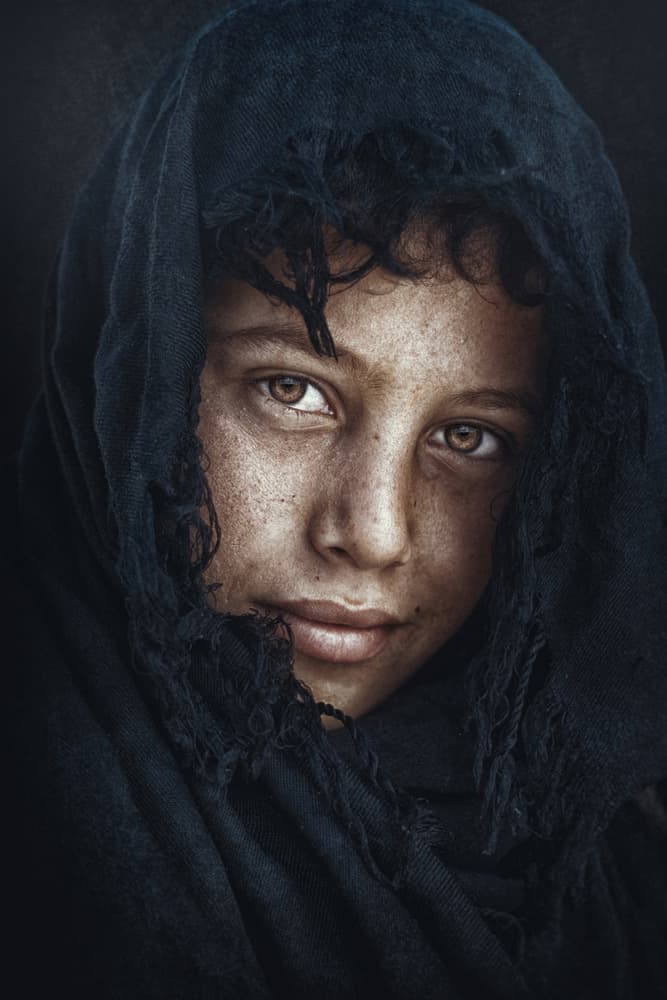 Child with Deep Eyes by Mohammed Sattar — canvas wall art