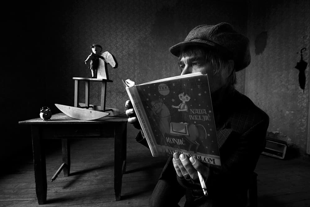 Quiet Man Reading by mario grobenski - psychodaddy — canvas wall art