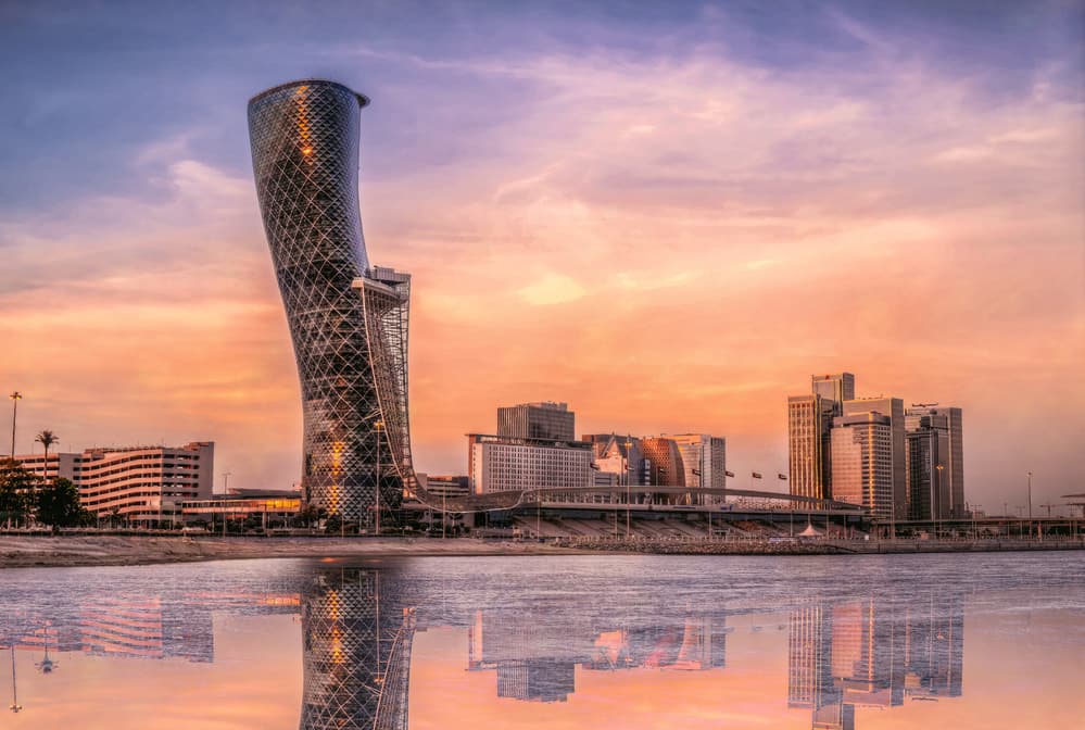 Capital Gate Sunset Reflections by Mohamed Kazzaz — canvas wall art