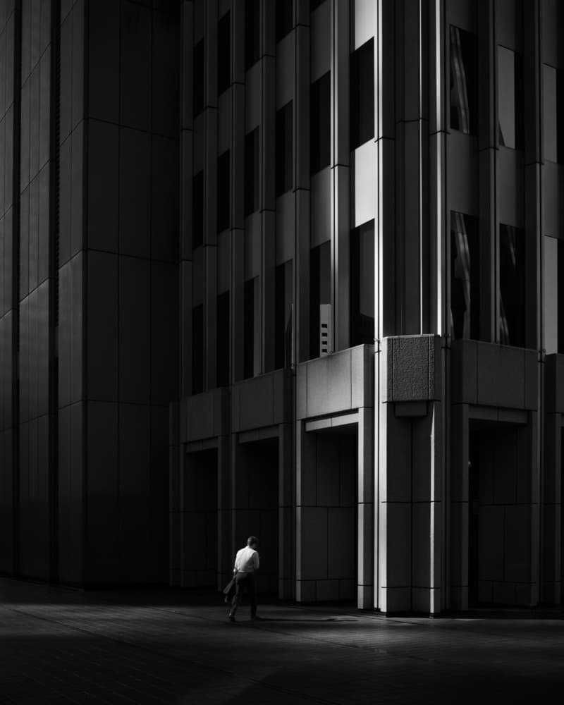 Man in City Shadows by Yasuhiro Takachi — canvas wall art