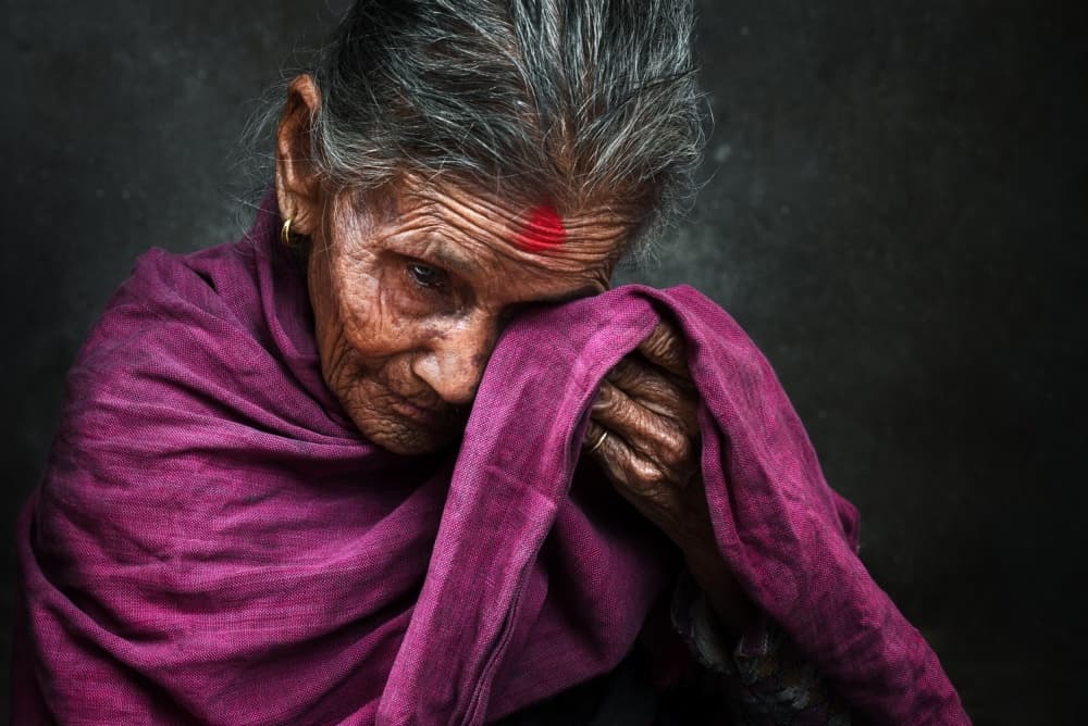 Contemplative Senior Portrait by Mohammed Baqer — canvas wall art
