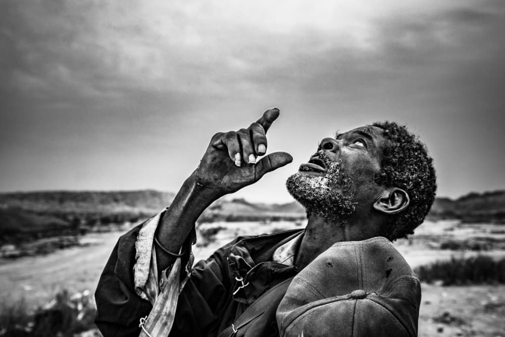 Man Pointing To Sky by João Coelho — canvas wall art