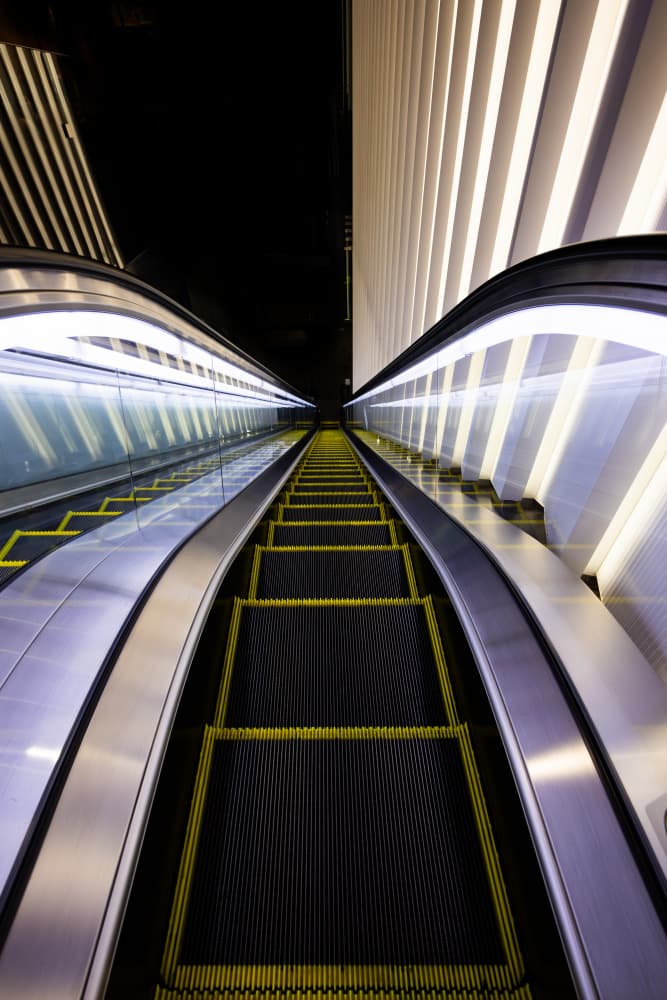Modern Escalator Ascent by Azriel Yakubovitch — canvas wall art