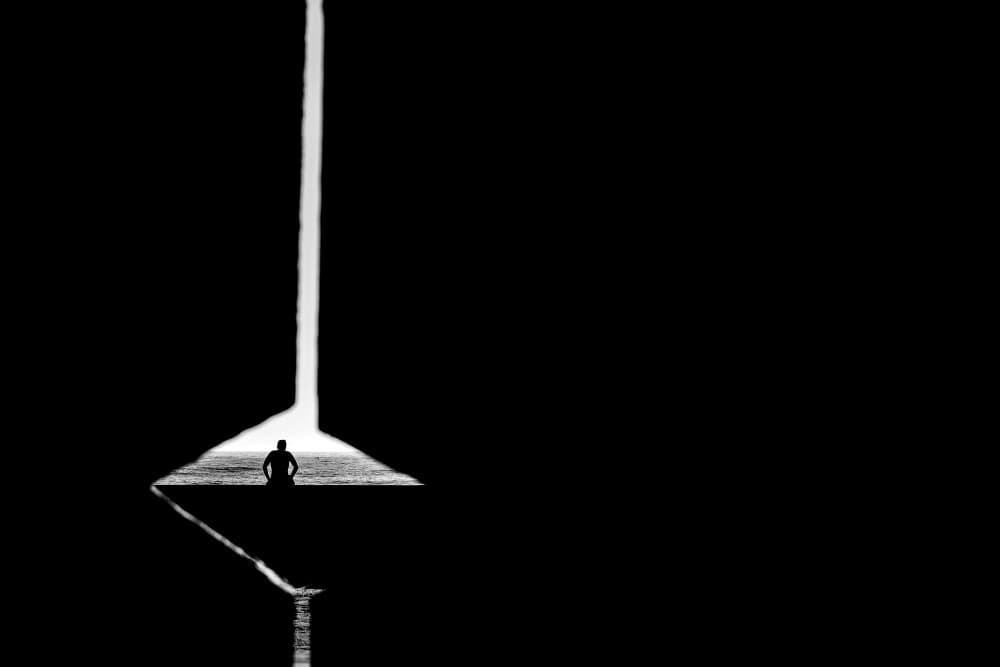 Lone Figure Reflective Light by Andrew Wixson — canvas wall art