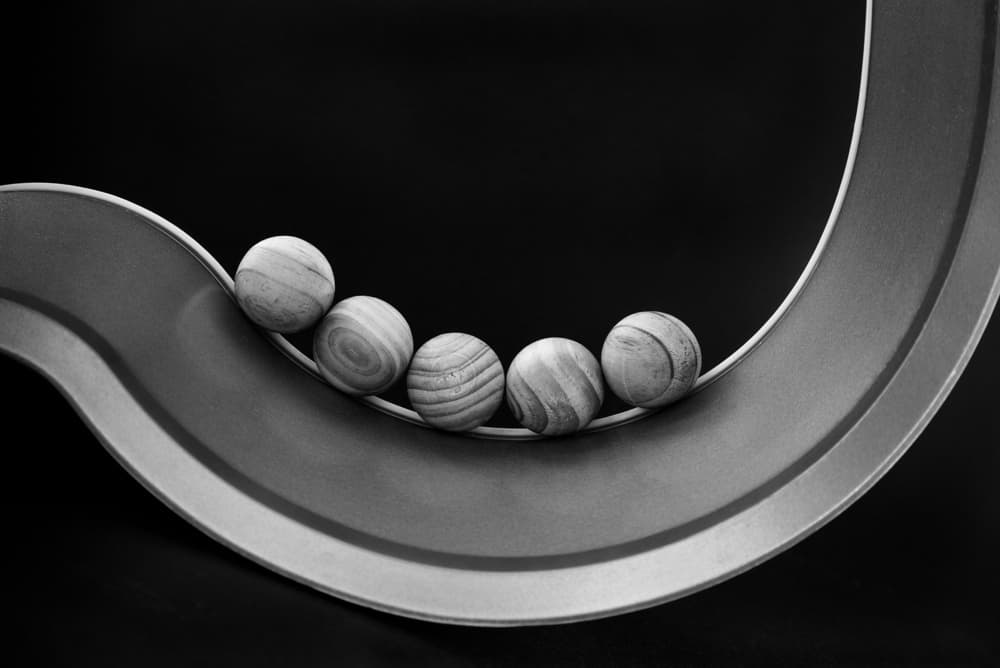Wooden Balls on Curve by Jacqueline Hammer — canvas wall art