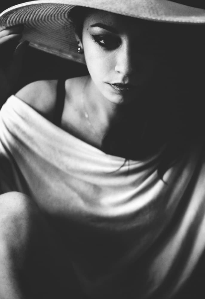 Mysterious Woman in Hat by Davide Mennitto — canvas wall art