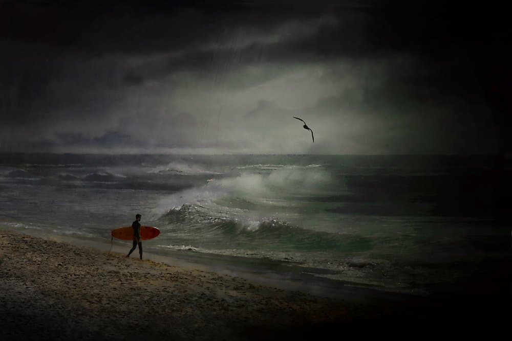 Lone Surfer Storm by Elena Arjona — canvas wall art