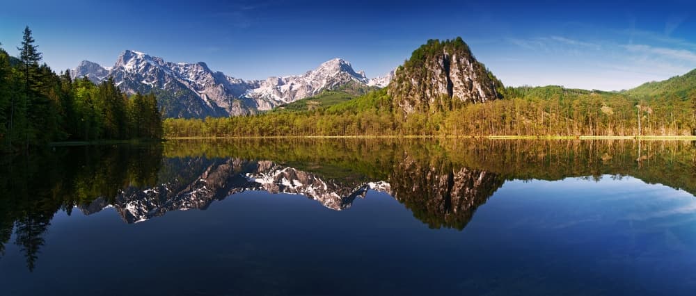 Serene Mountain Lake Reflection by Burger Jochen — canvas wall art