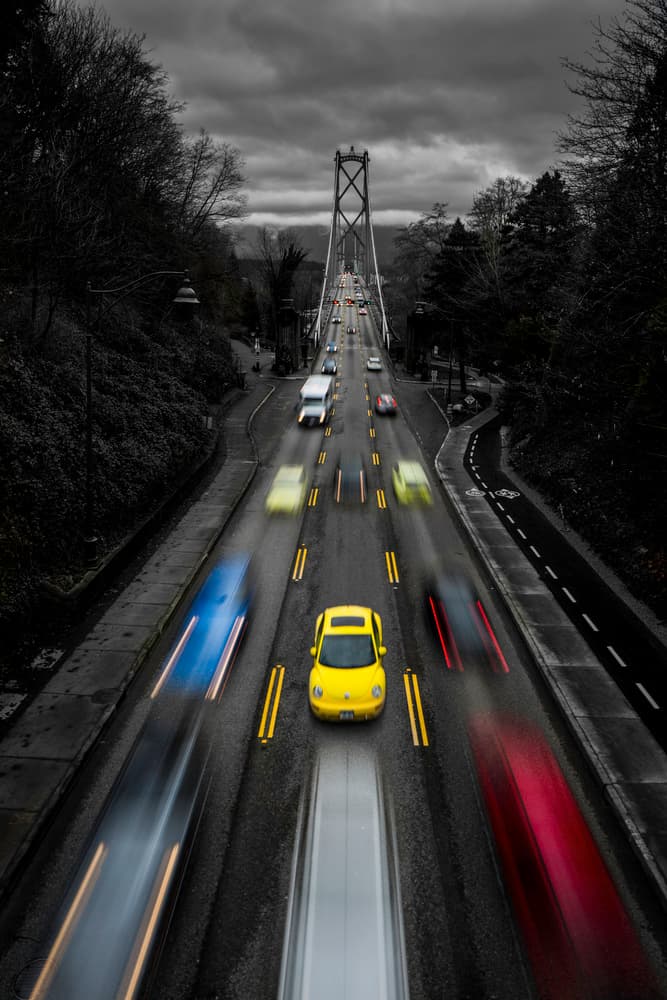 Speeding Yellow Car Bridge by Tony Xu — canvas wall art