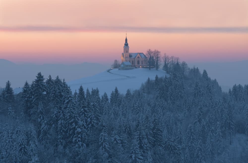 Pink Sky Winter Church by Drago Vogrinec — canvas wall art