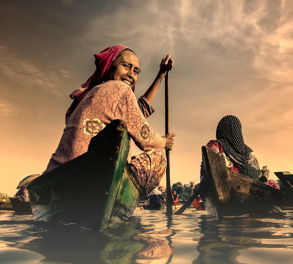 Smiling Market Woman by Rooswandy Juniawan — canvas wall art