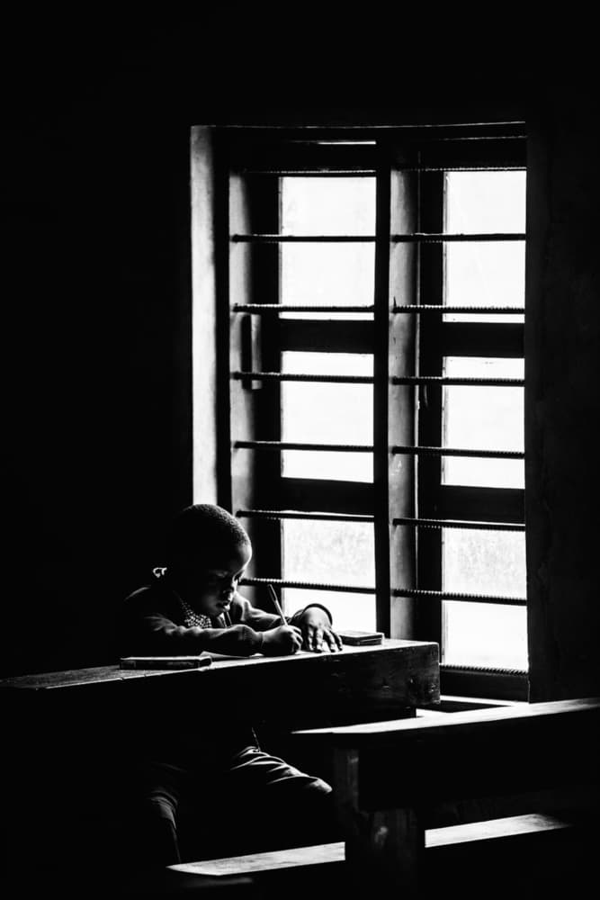 Child Studying by Window by Vedran Vidak — canvas wall art