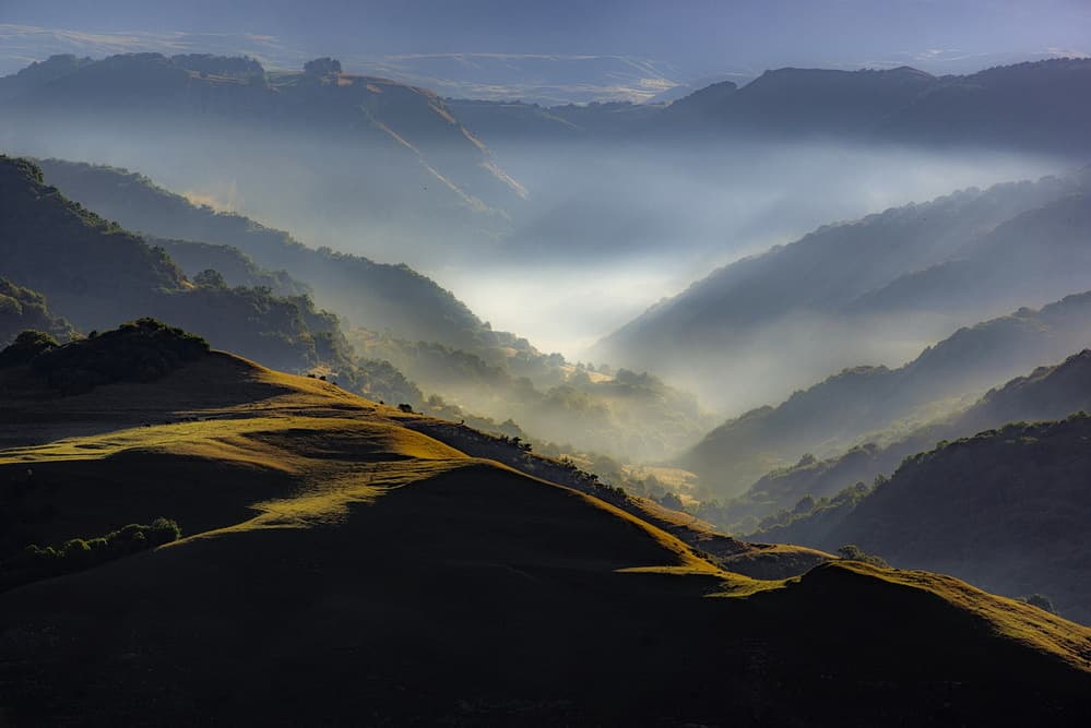 Misty Morning Valley by Arsen Alaberdov — canvas wall art