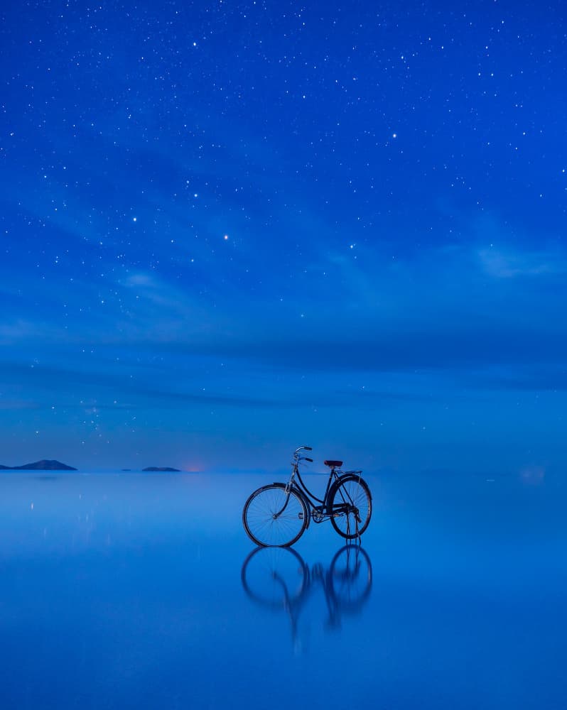 Starry Night Bicycle Reflection by Alexander Lozitsky — canvas wall art