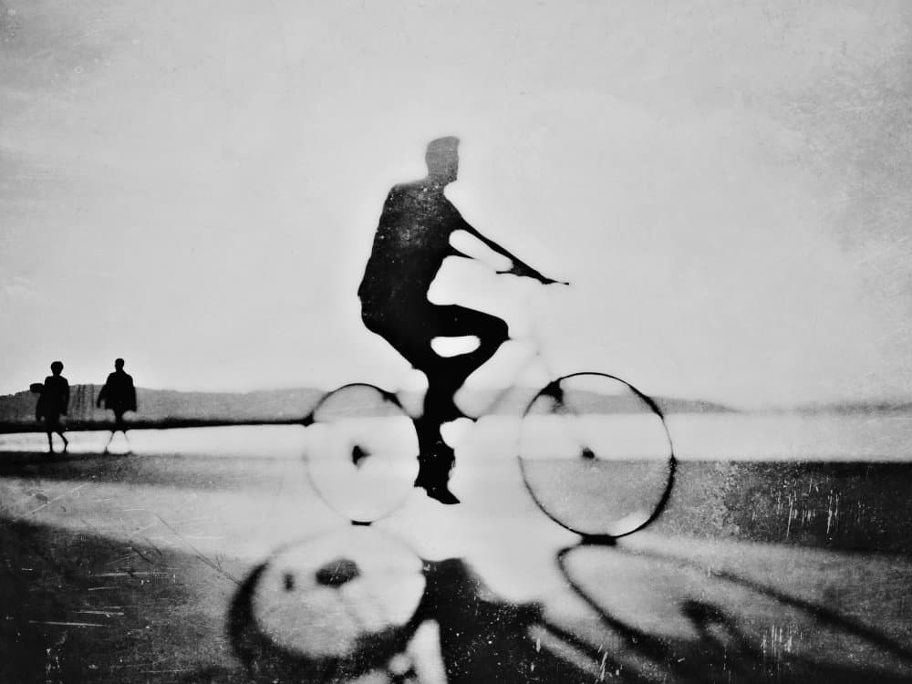Dreamy Cyclist Silhouette by Yalım Vural — canvas wall art