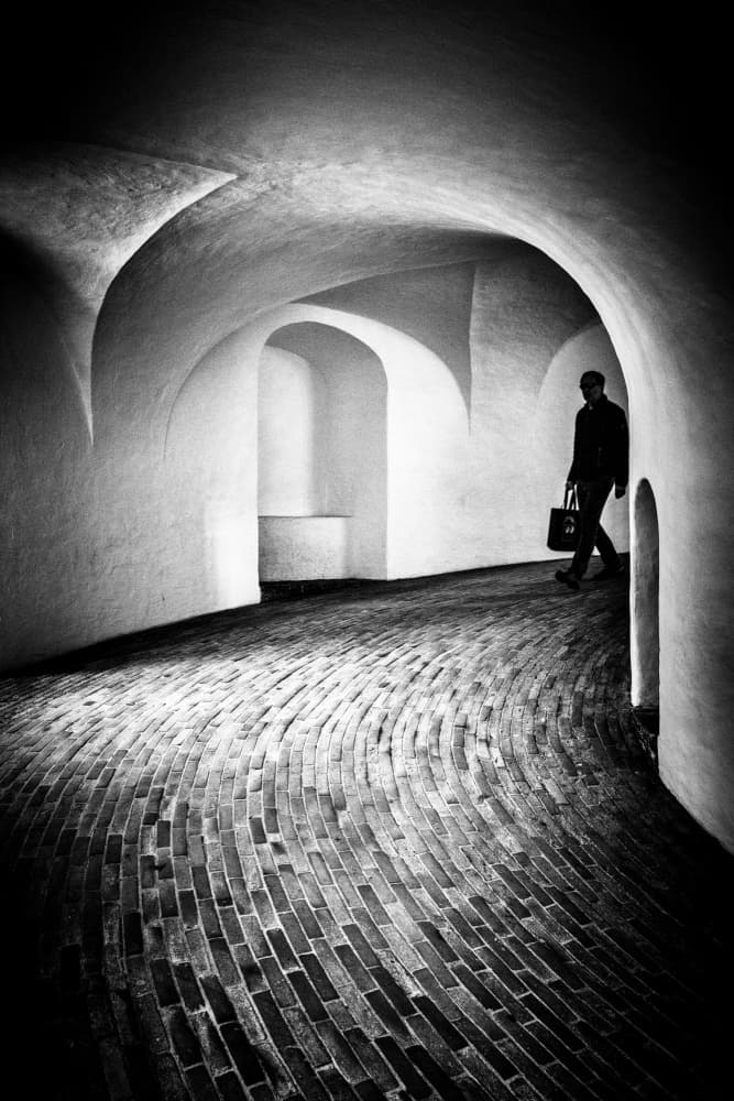 Man on Arched Path by Stefan Buder — canvas wall art