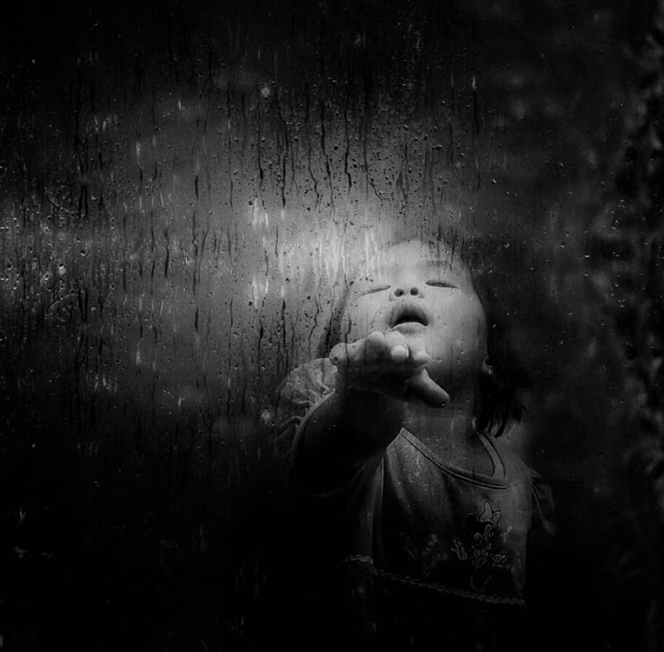 Child At Rainy Window by Hari Sulistiawan — canvas wall art