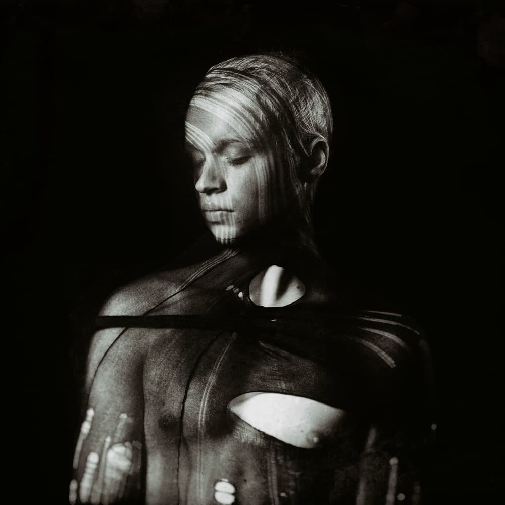 Contemplative Light Portrait by mario lotzin / uwe friessner — canvas wall art