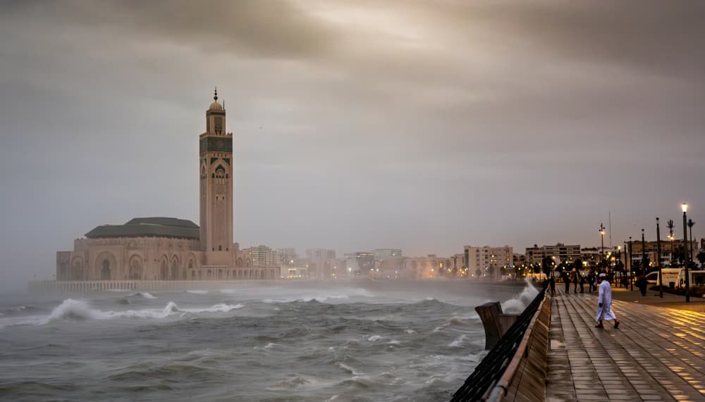 Hassan II Mosque Oceanfront Evening by Andrei Baisan — canvas wall art
