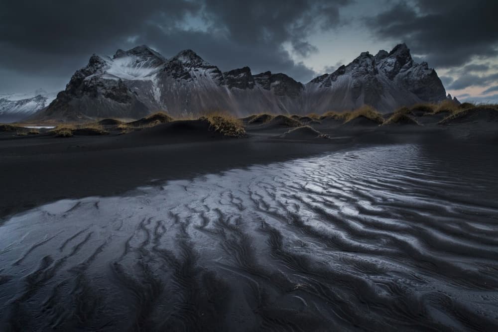 Snowy Peaks Black Sand by Philip Eaglesfield — canvas wall art