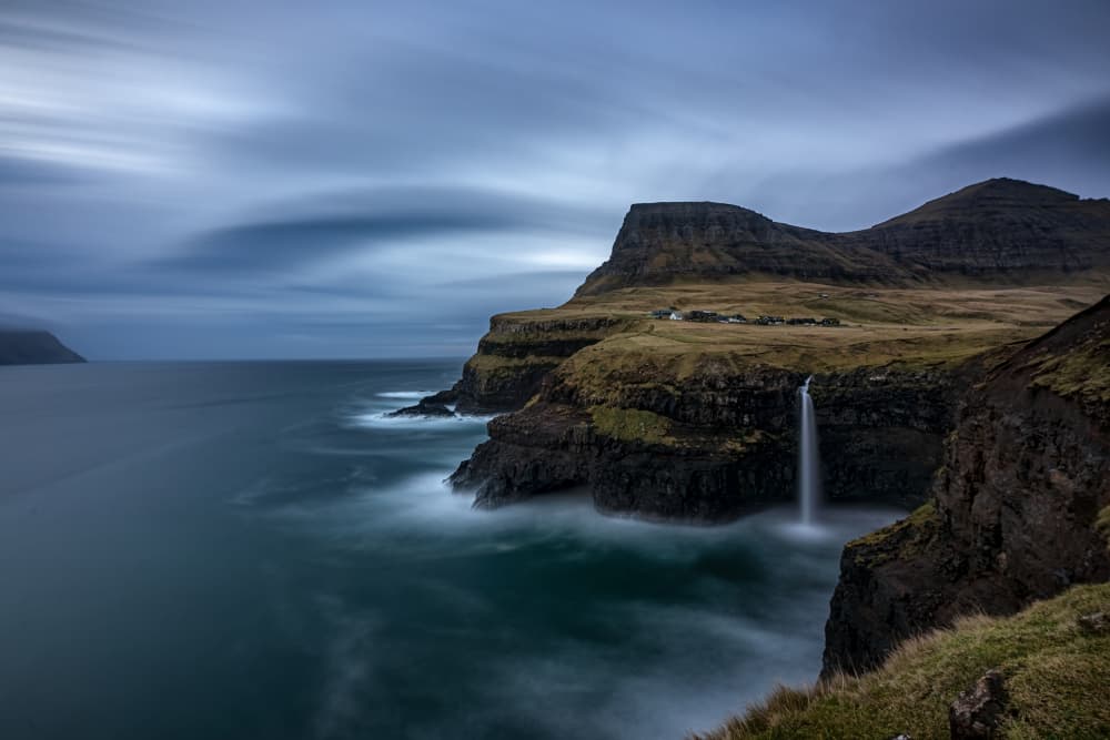 Dramatic Coastal Waterfall by James Zhen Yu — canvas wall art