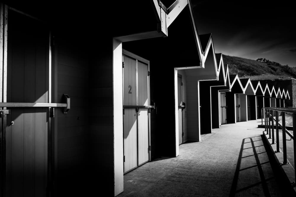 Beach Huts and Shadows by Lee Kershaw — canvas wall art