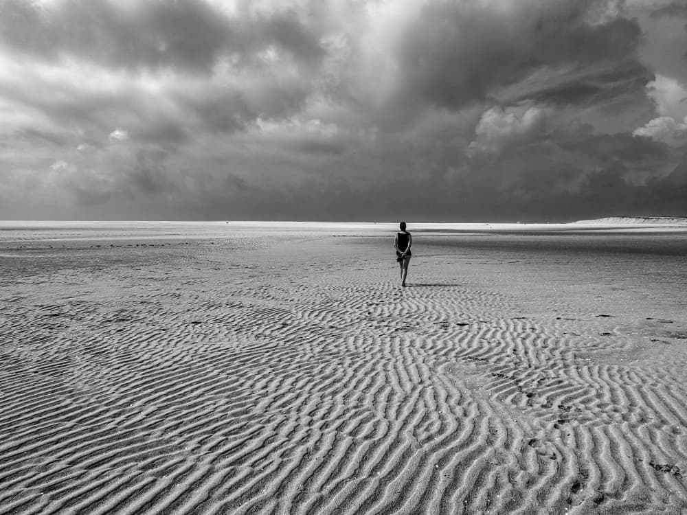 Lone Figure Beach Walk by Adolfo Urrutia — canvas wall art