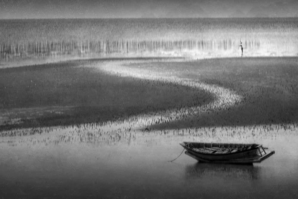 Lone Boat on Tidal Flats by Ekkachai Khemkum — canvas wall art