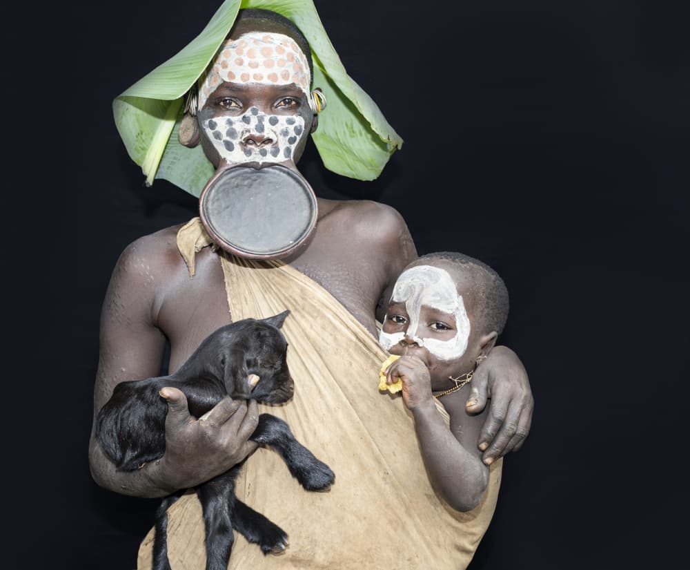 Mursi Mother with Baby by Iris Wiener — canvas wall art