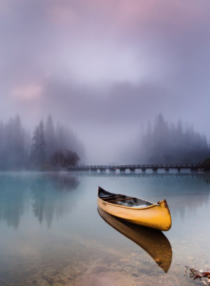 Misty Lake Golden Canoe by Evgeny Chertov — canvas wall art