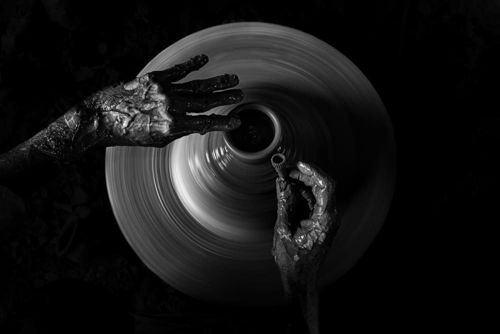 Potter's Hands Creating by Kuntal Biswas — canvas wall art
