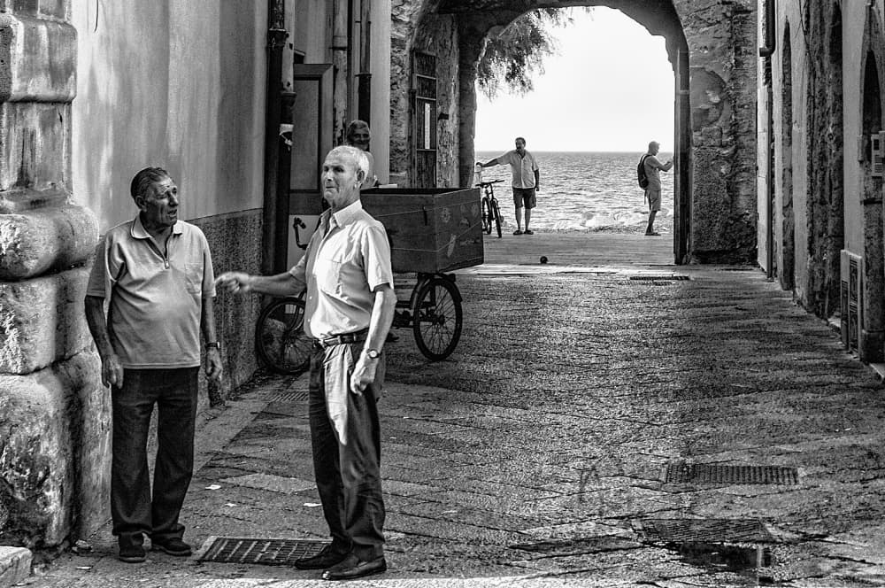 Coastal Town Conversation by Raffaele Maglione — canvas wall art