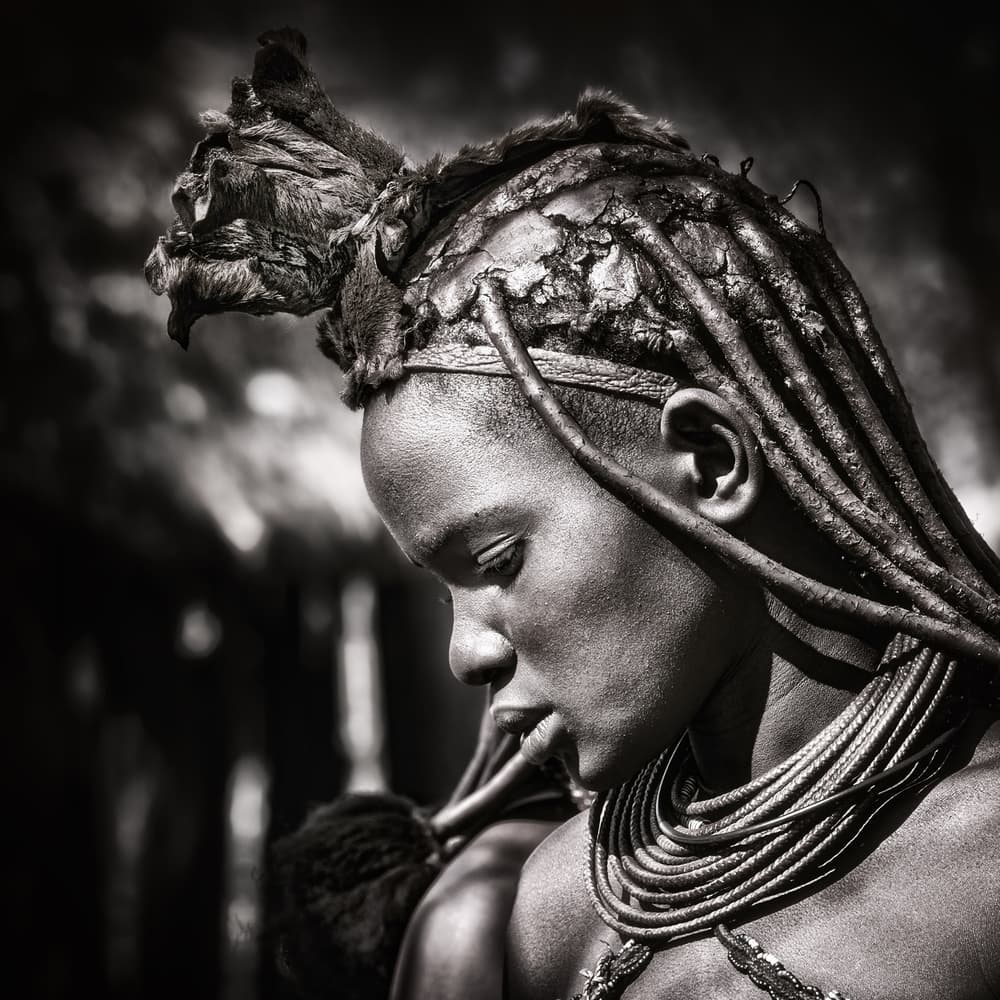 Contemplative Himba Woman by Piet Flour — canvas wall art