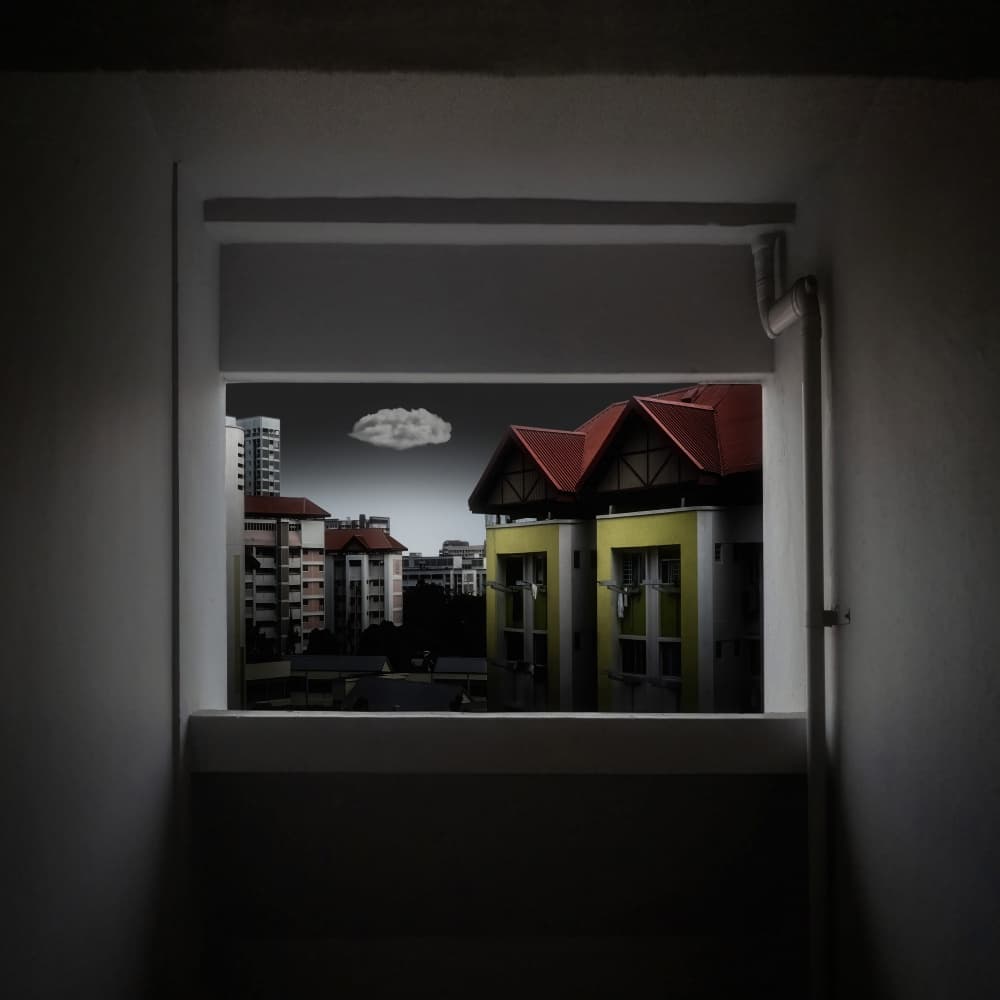 Lone Cloud Over City by Amatou T — canvas wall art