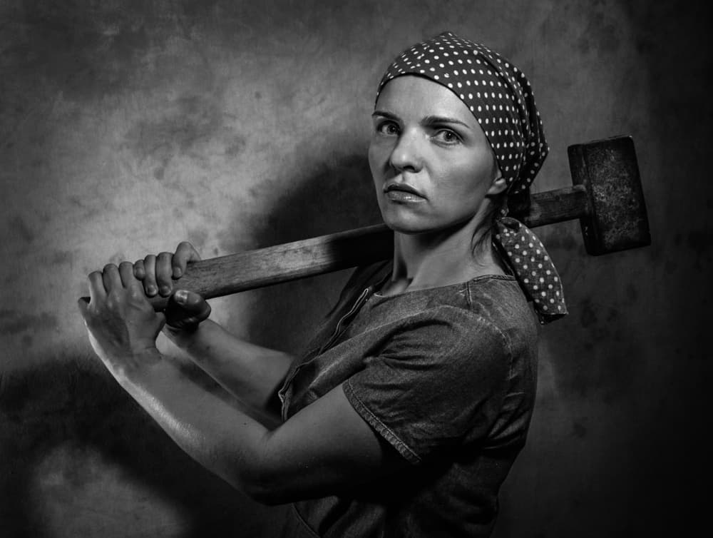 Determined Woman Sledgehammer by Viktor Cherkasov — canvas wall art
