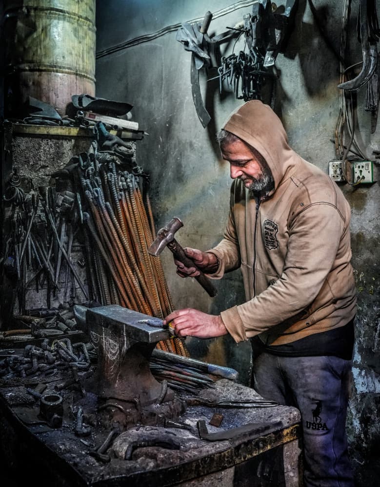 Artisan Forging Metal by Bashar Alsofey — canvas wall art