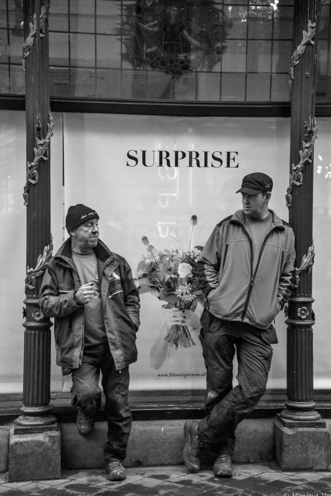 Two Men Street Surprise by monique gilleman — canvas wall art