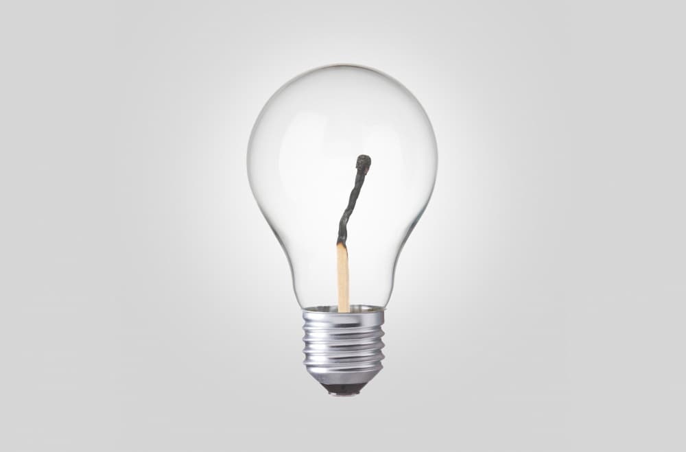 Extinguished Idea Bulb by Artem Pozdniakov — canvas wall art